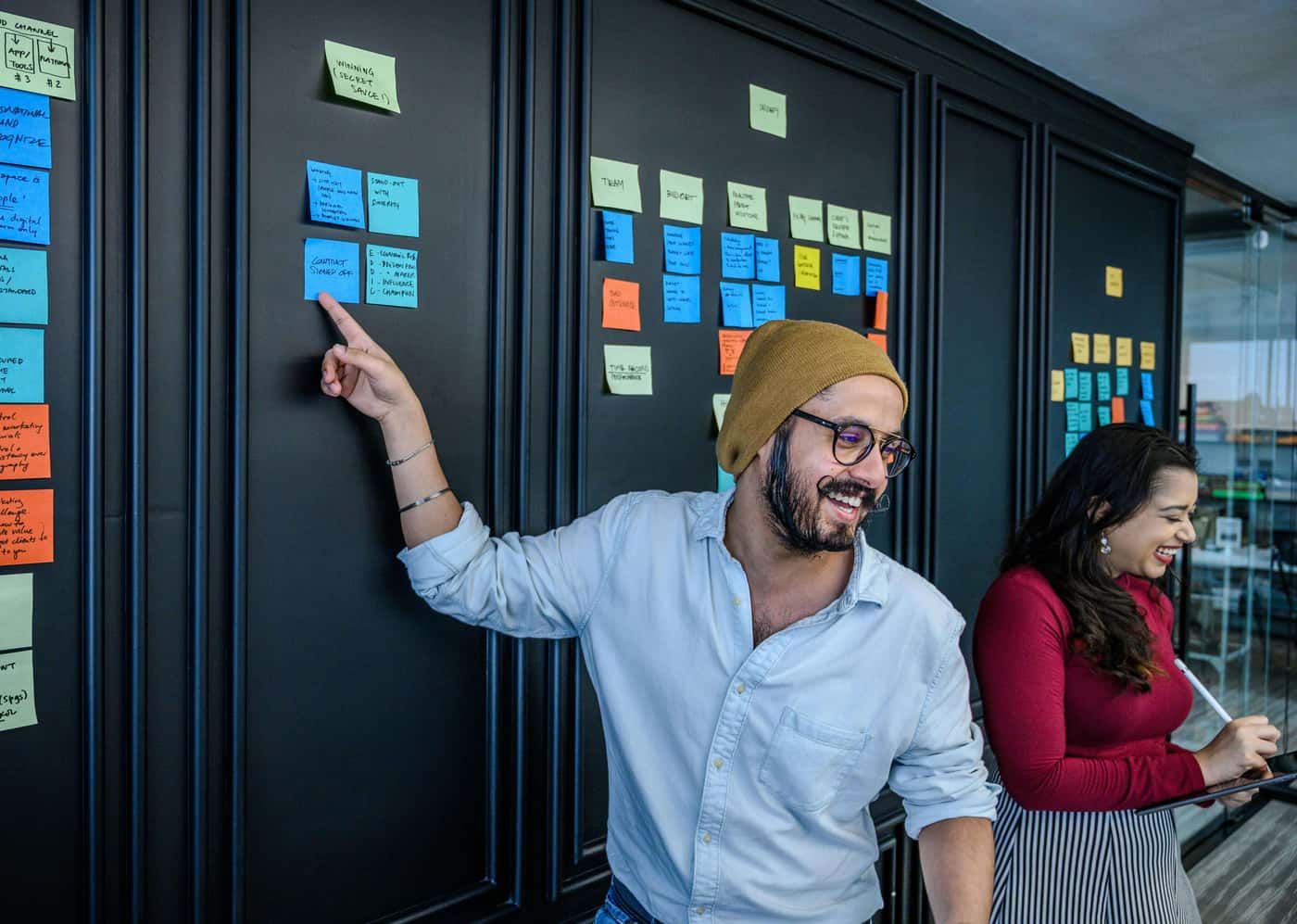 product-manager-planning-roadmap-with-sticky